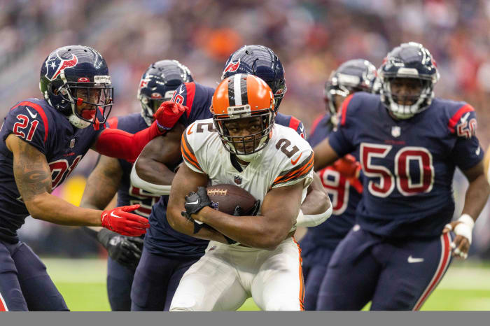 Cleveland Browns Amari Coooper drives past multiple Houston Texans defenders after a gain of 53 yards in the first quarter at NRG Stadium in Houston, Texas.
